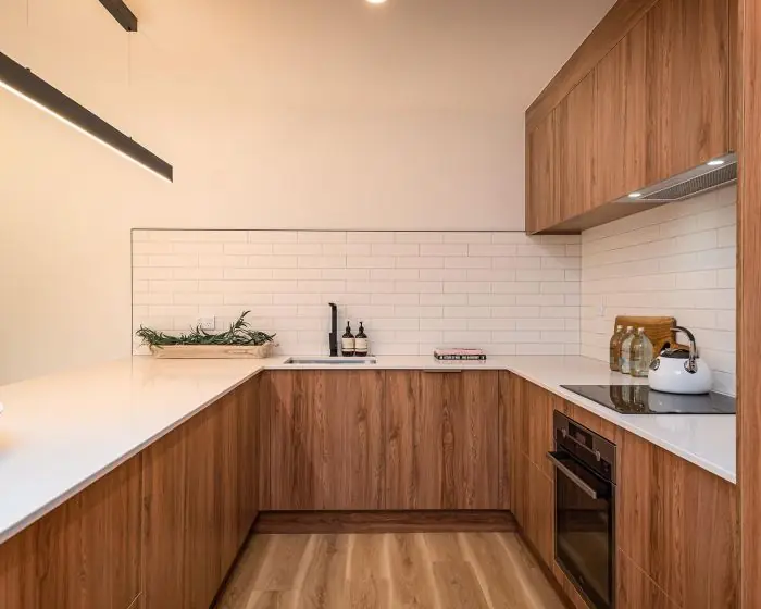 Alba zero silica quartz — warm timber kitchen application